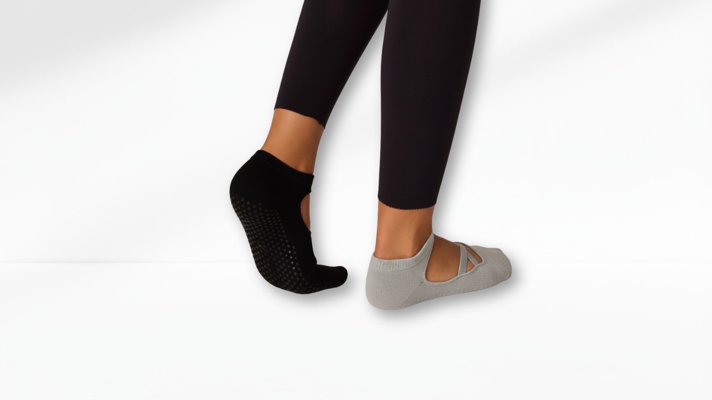 Person wearing black and gray Grip Socks – Ballet Mary Jane on a white background