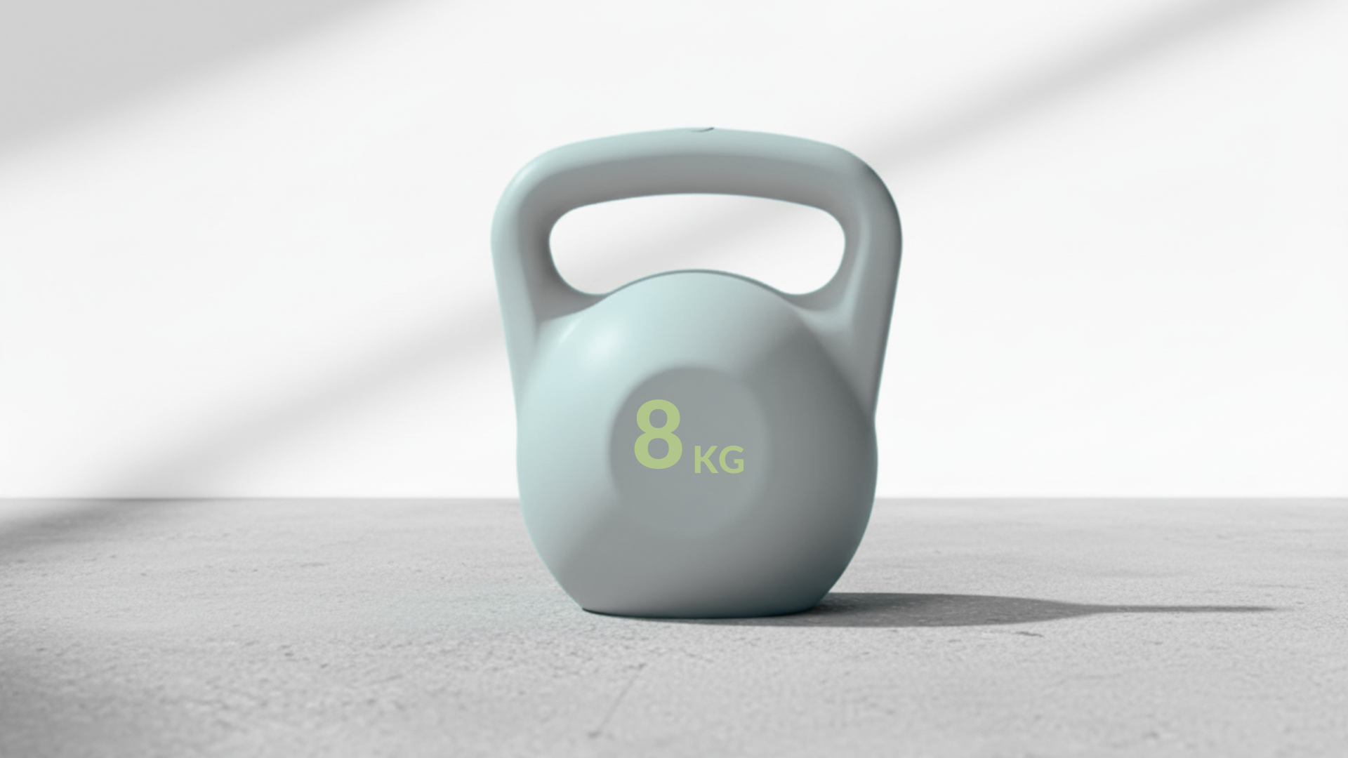 8kg light grey  kettlebell on a gray surface with a white background