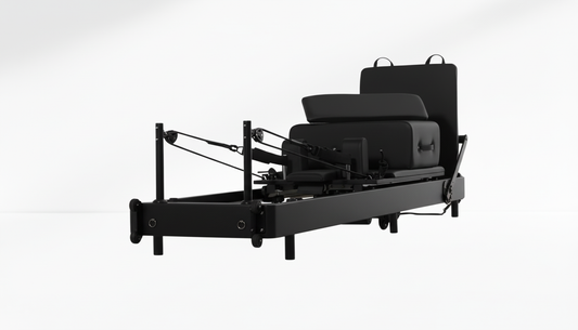 Black Pilates Reformer – Rebounder & 6-Level Resistance with box  on a white background