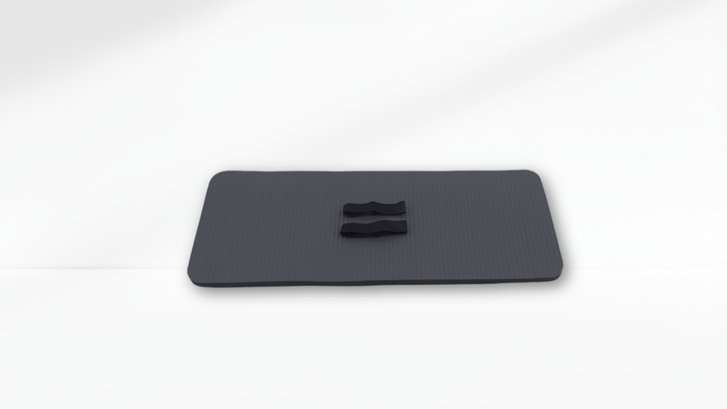 Black mat object with a central indentation on a white background