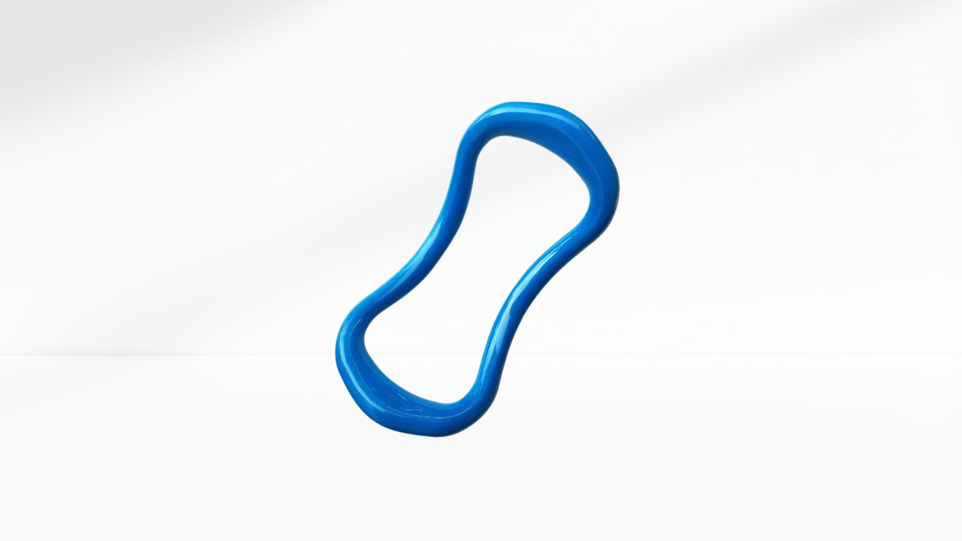 Blue pilates ring on a white background