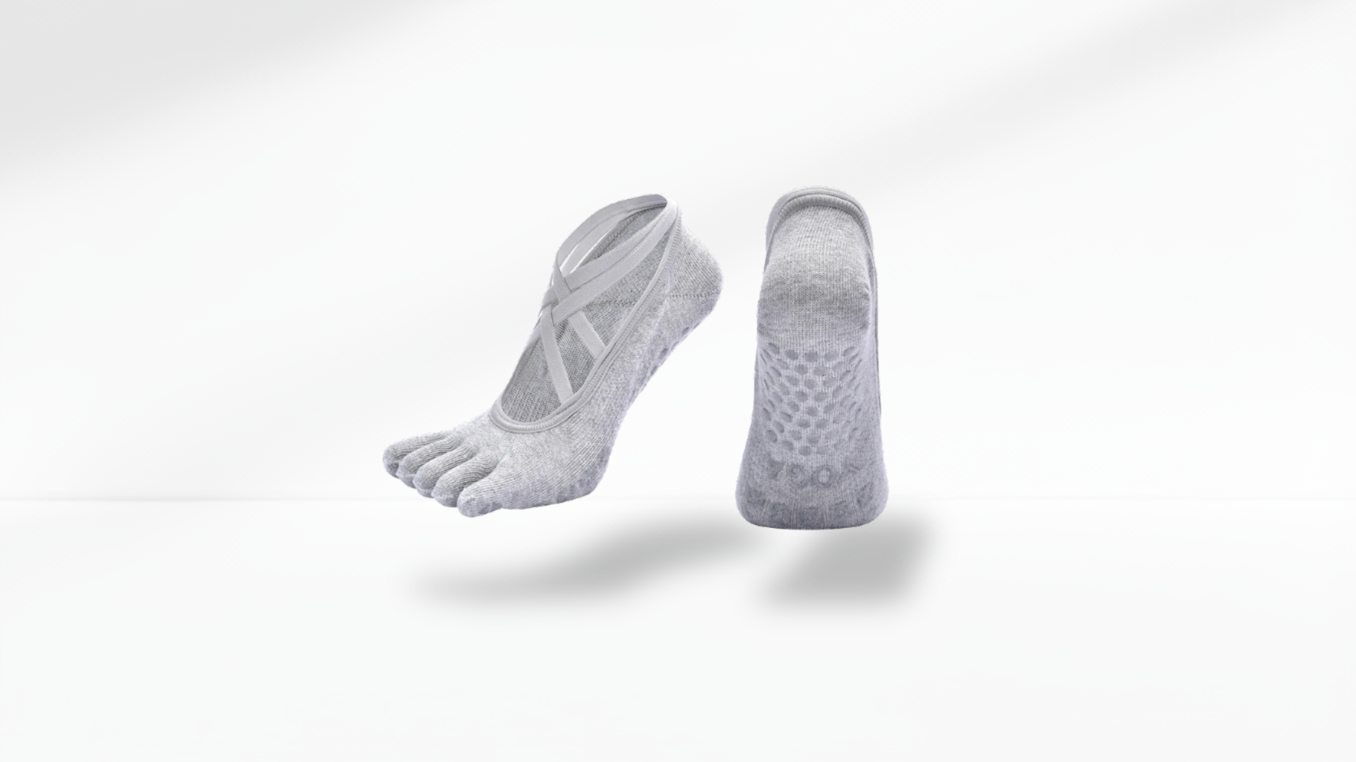 Gray toe-separated socks on a white background