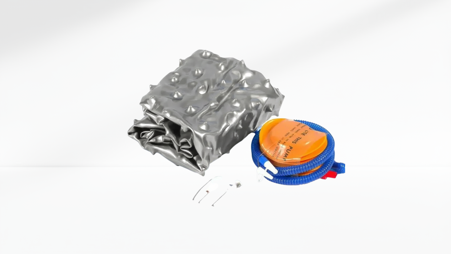 Inflatable grey anti-slip ball with pump on a white background