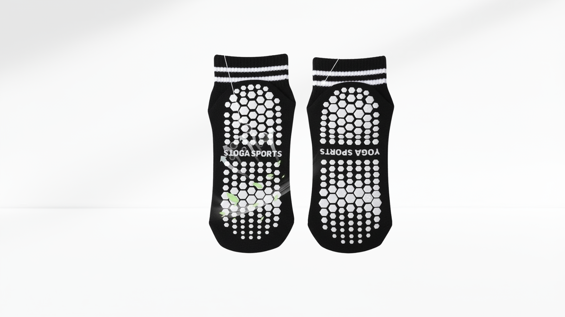 Pair of black and white grip socks with 'Sloga Sports' branding on a white background