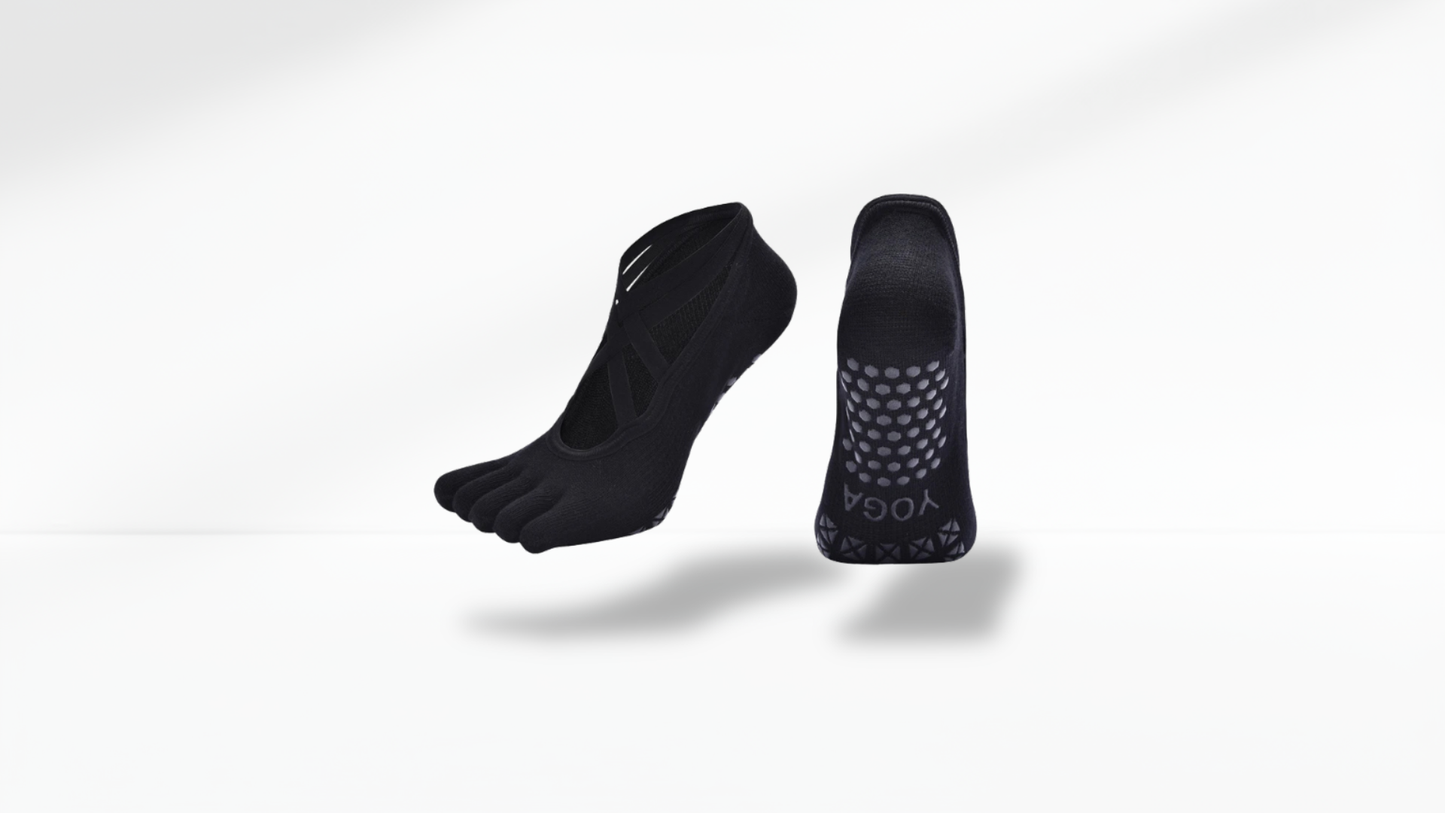 Pair of black toe sock running socks on a white background