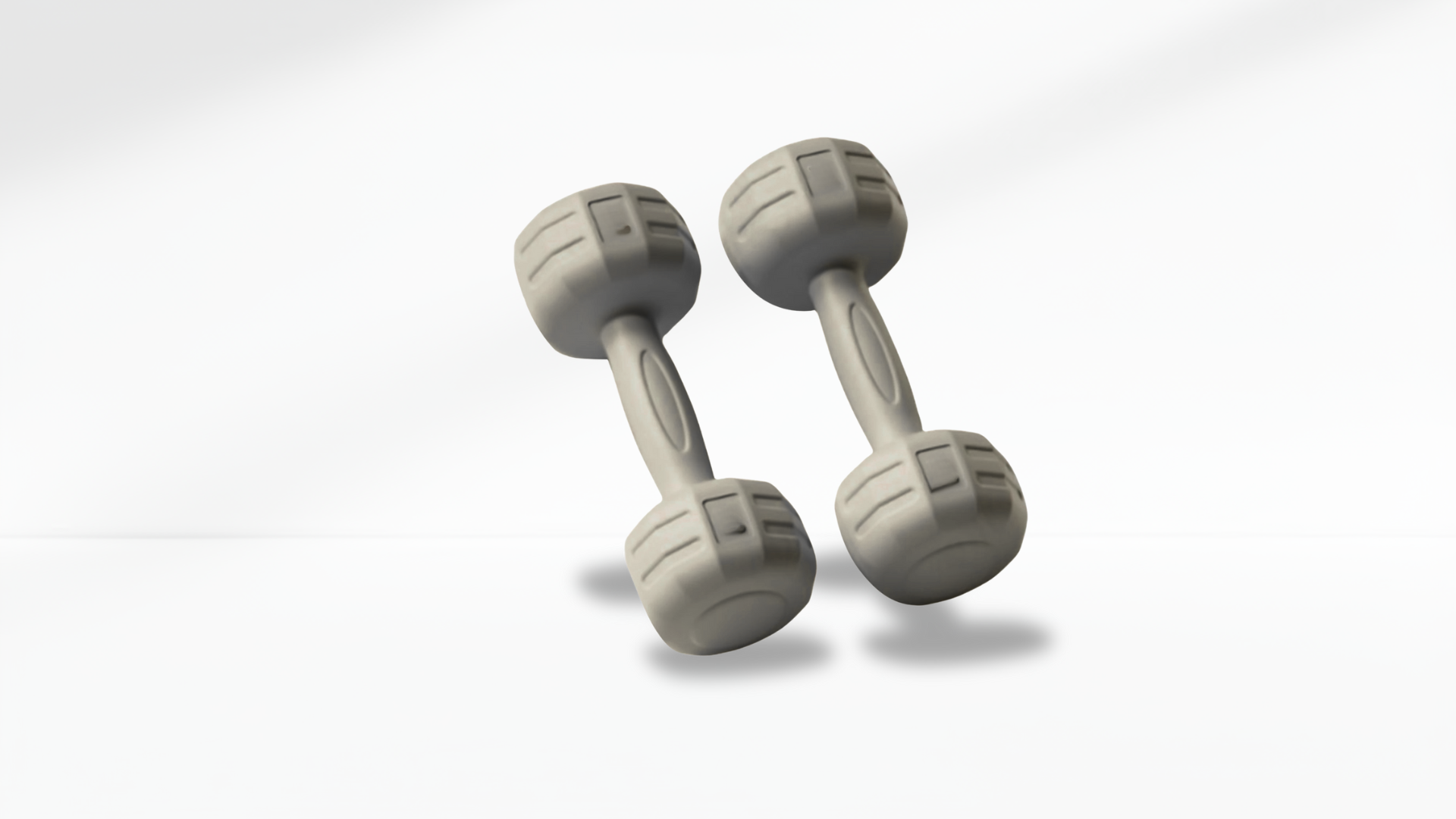 Pair of gray dumbbells on a white background