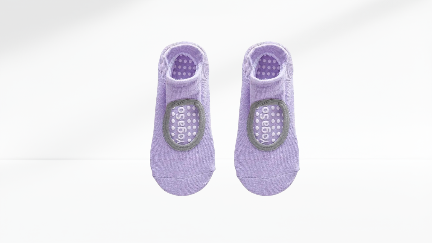 Pair of purple grip socks with gray patterns on a white background