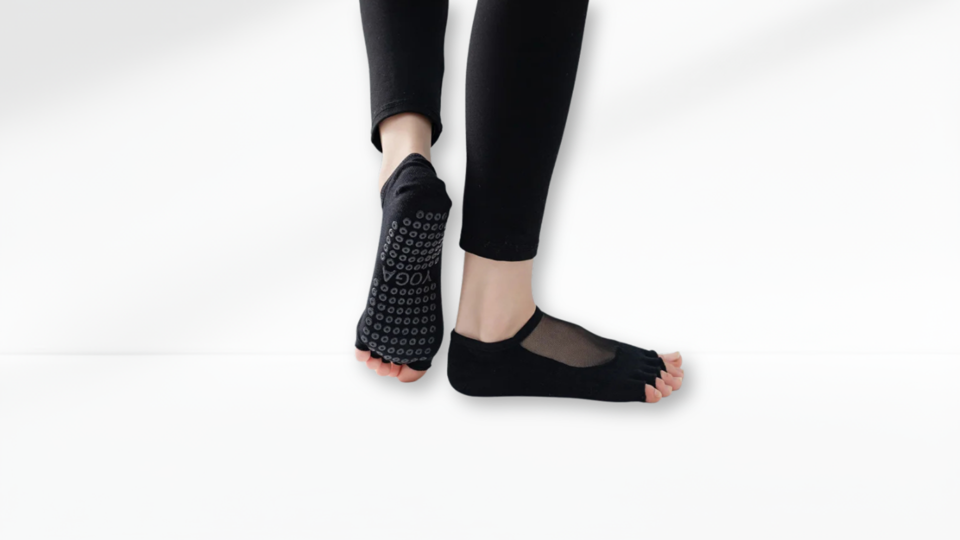 Person wearing black Toe Socks Mesh Grip on a white background