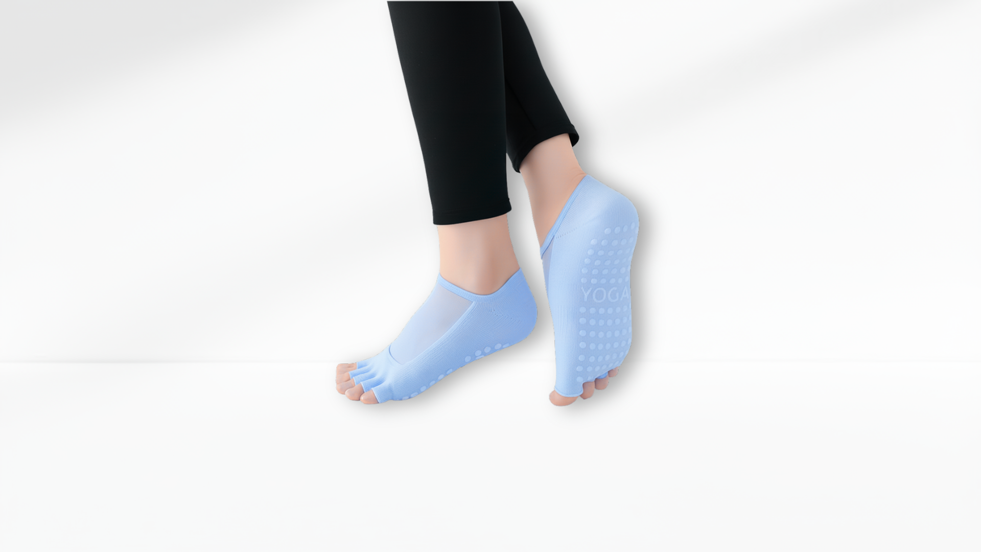Person wearing blue toe Mesh Grip separators on a white background