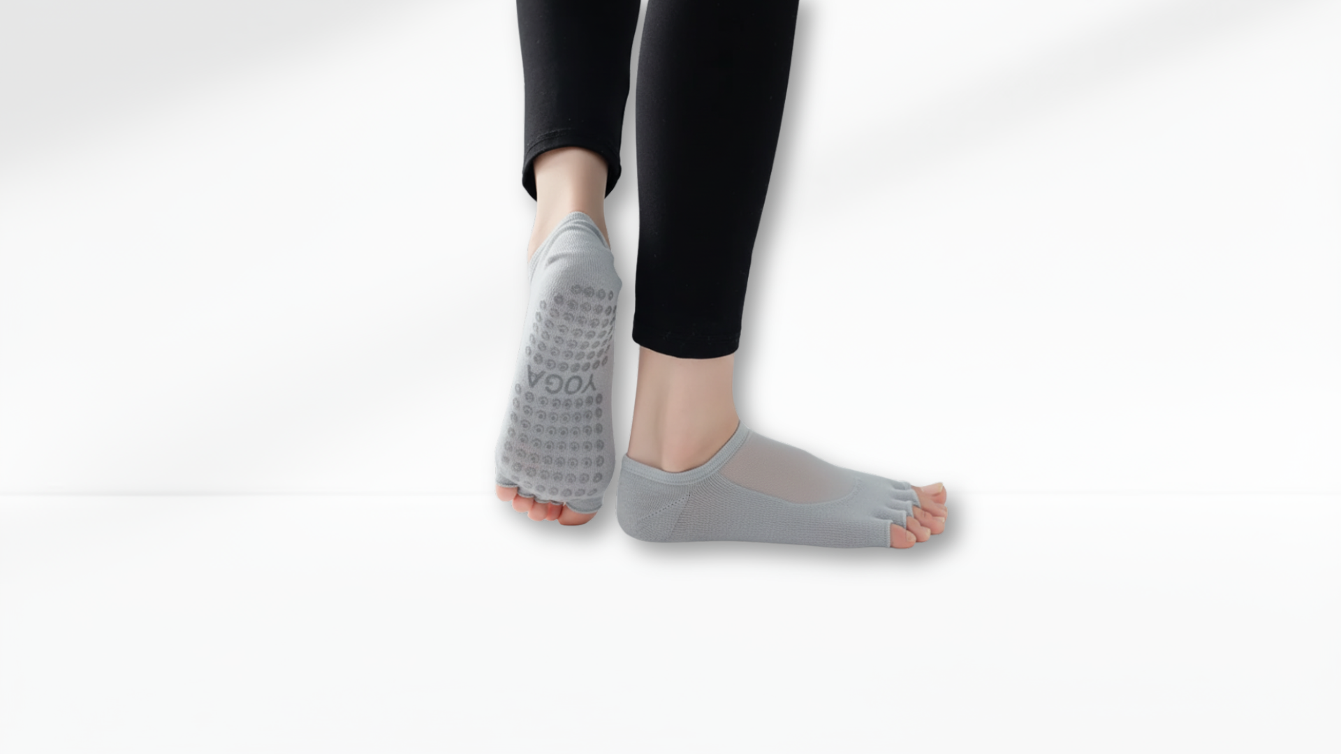 Person wearing gray Toe Socks Mesh Grip on a white background