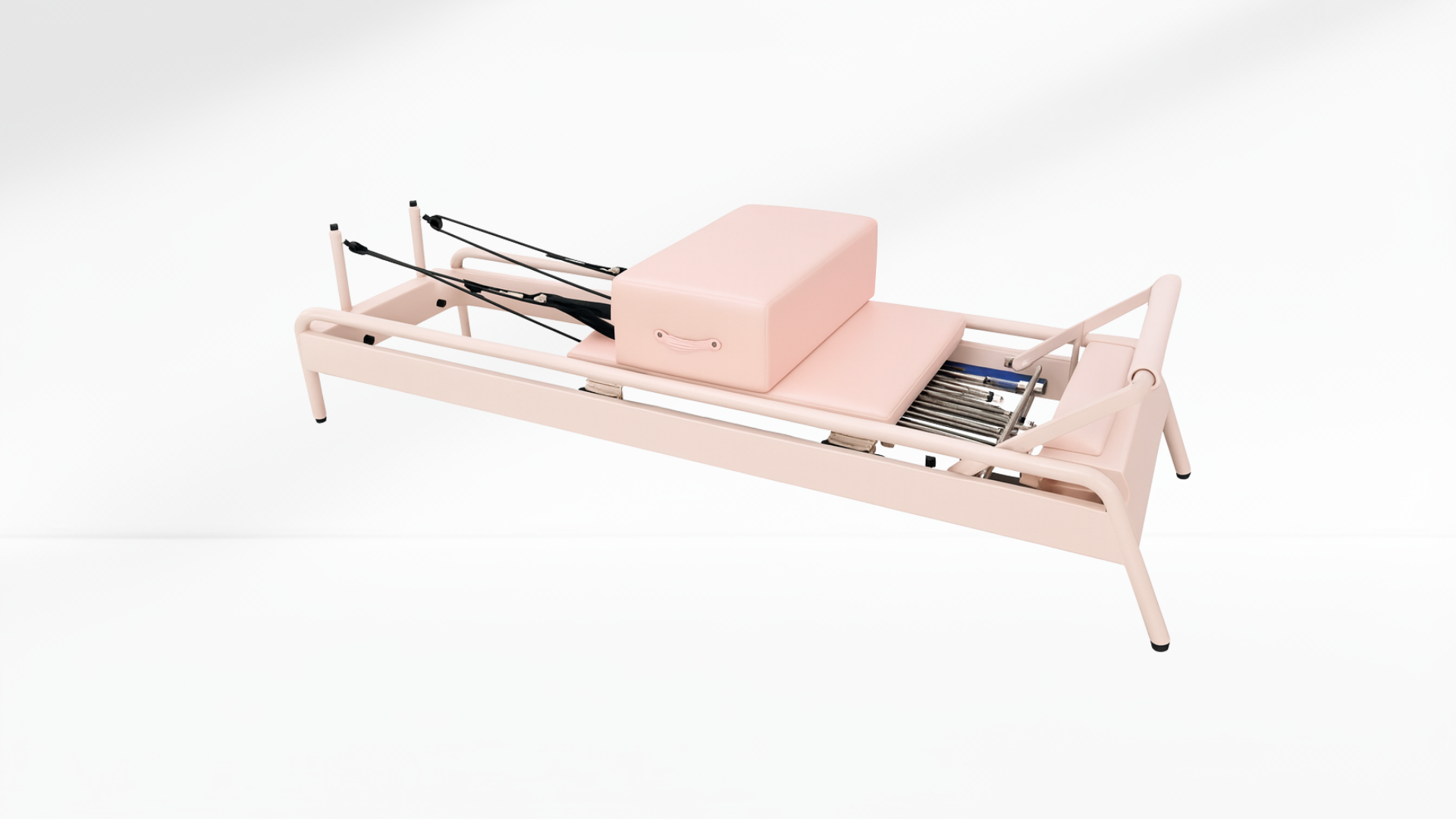 Pink Pilates reformer on a white background