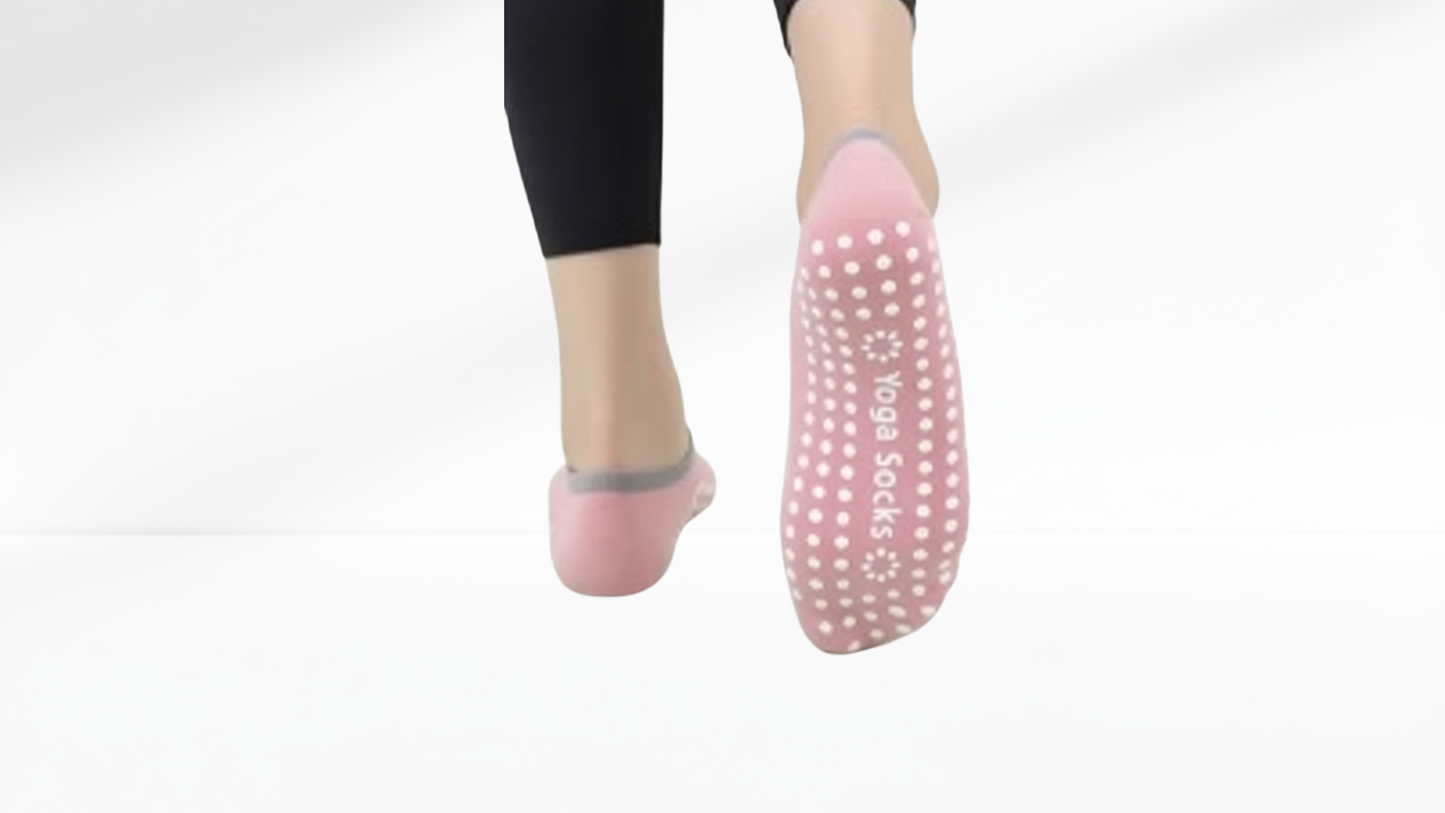 Pink grip sock ballet on a white background