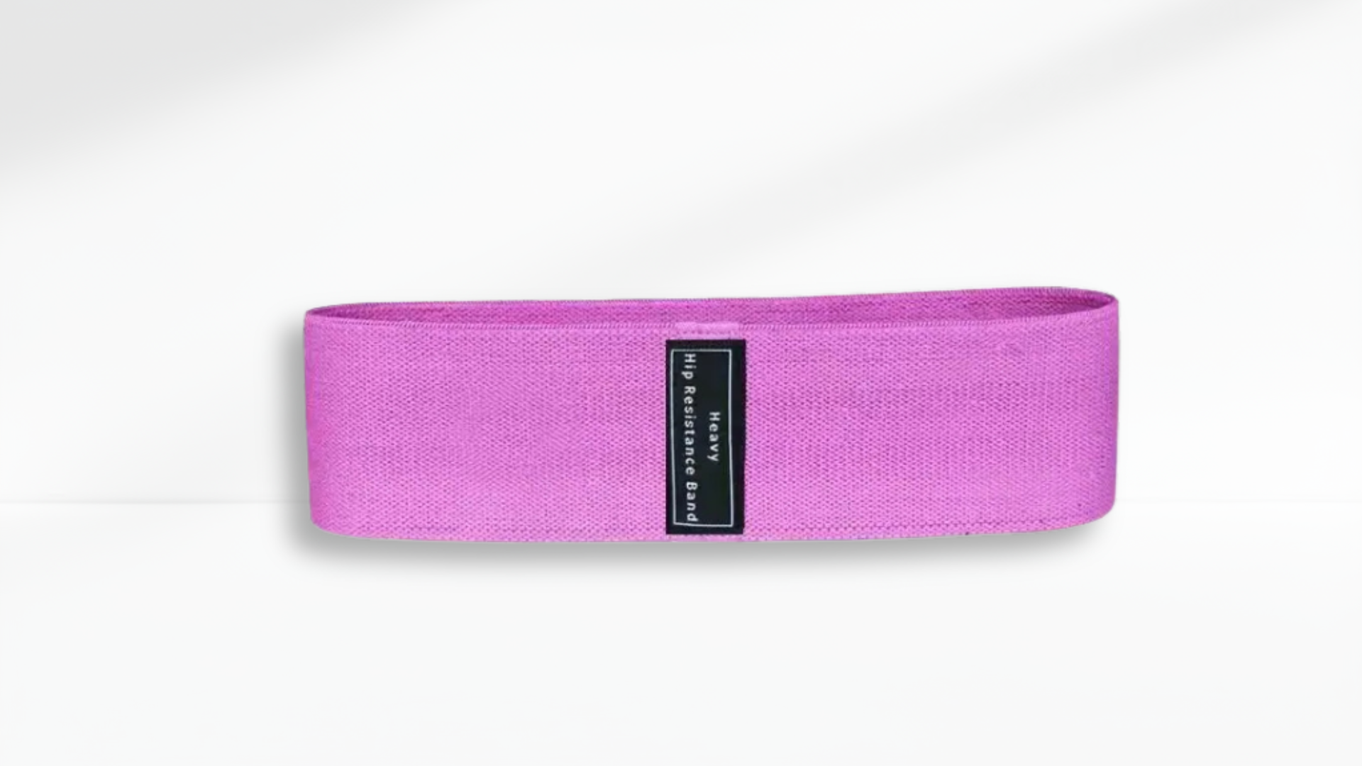 purple resistance band with a black label on a white background