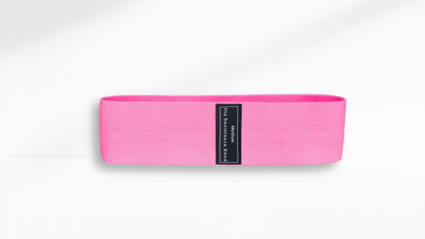 Pink resistance band with a label on a white background
