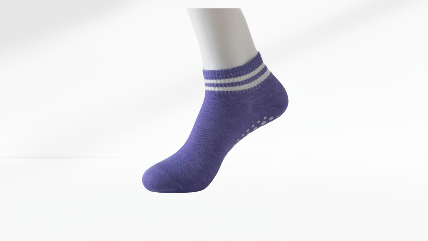 Purple ankle grip sock with white stripes on a white background