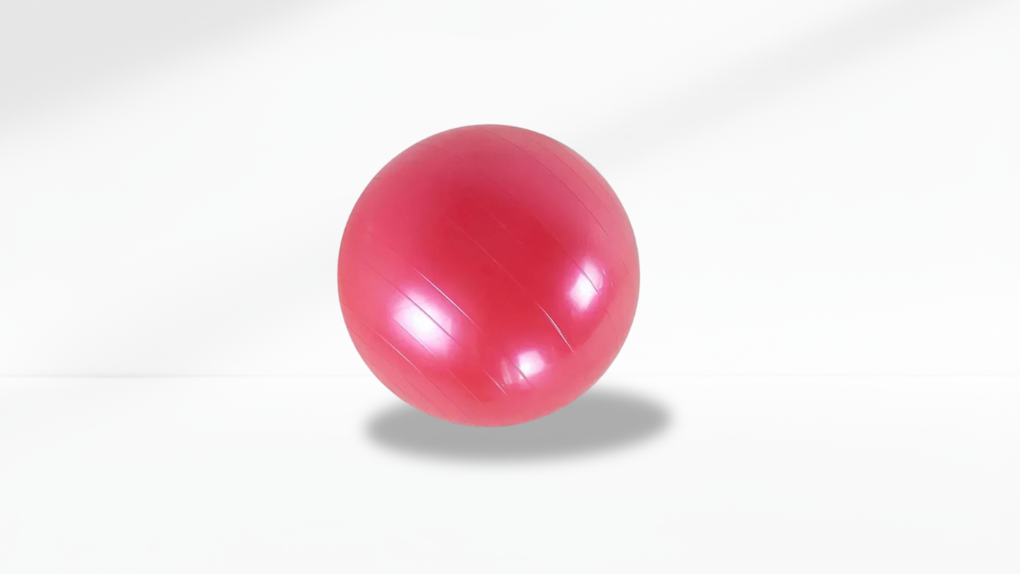 Red exercise ball on a white background