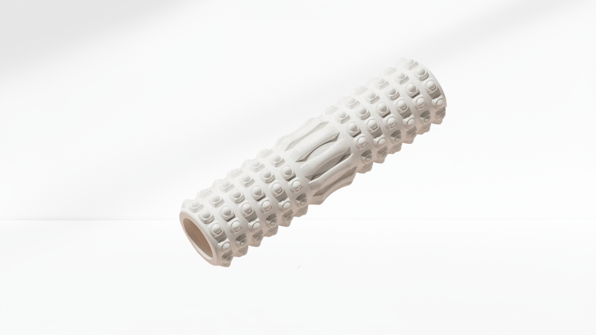 White textured roller on a light gray background