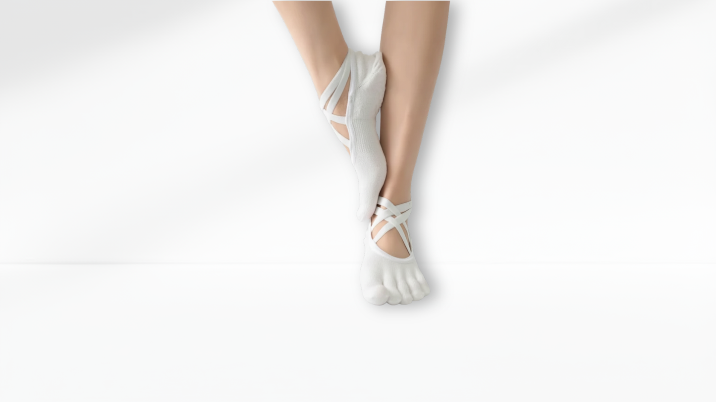 White toe sock sandals worn by a person on a white background