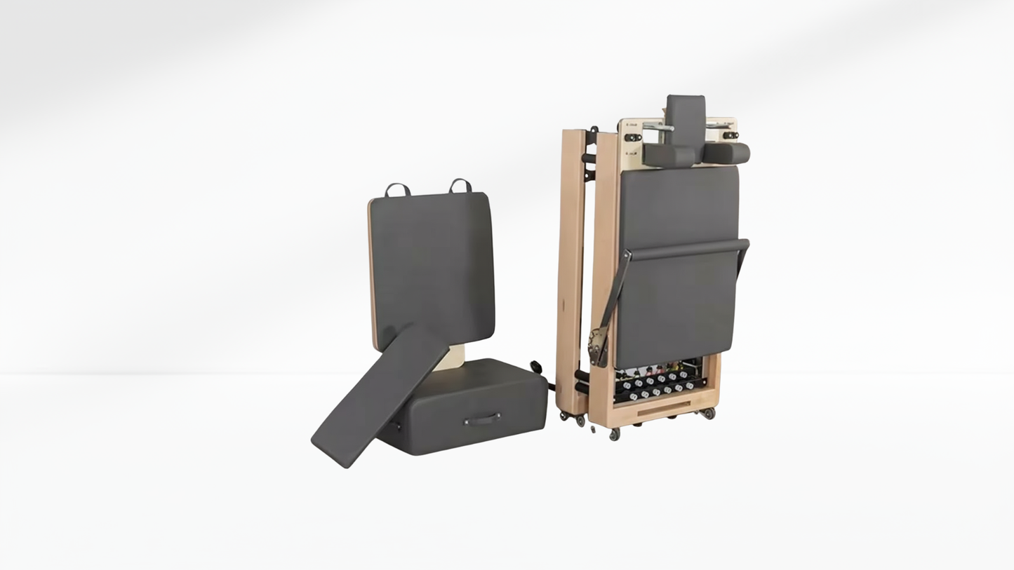 Wooden Pilates Reformer – Rebounder & 6-Level Resistance flooding with gray cushioned seat and backrest on a white background