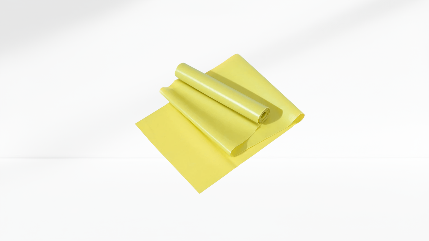 Yellow Yoga & Pilates Elastic Resistance Band roll on a white background