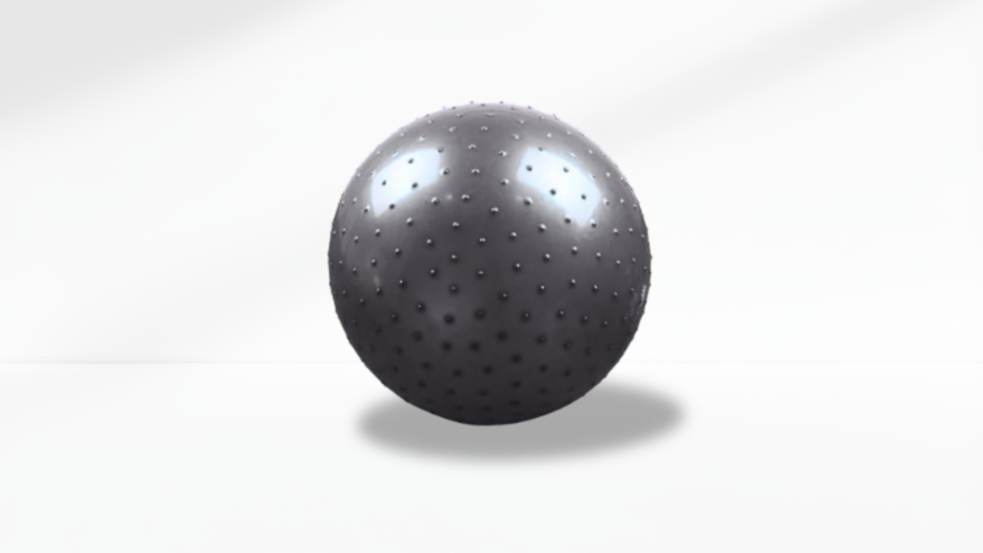 grey anti-slip ball with holes on a white background