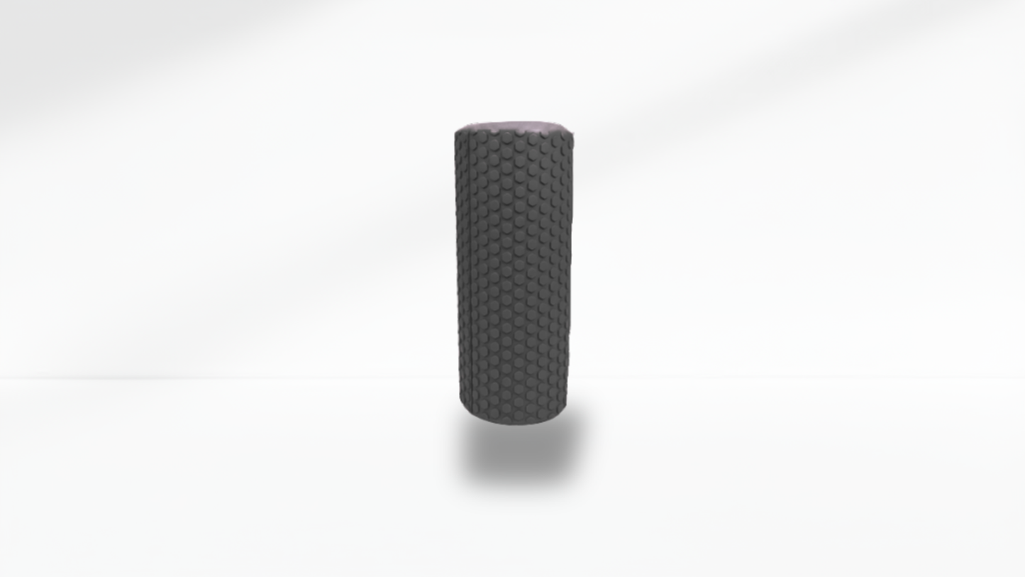 Front view of a black textured half foam roller standing upright on a white background with soft shadow, showing the full massage texture.