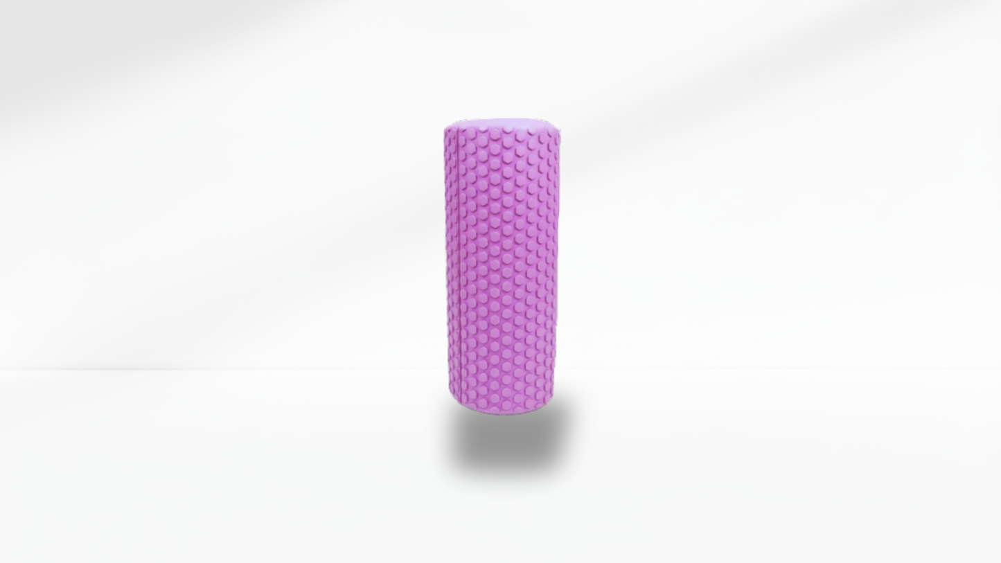 Front view of a purple textured half foam roller standing upright on a white background with soft shadow, showing the full massage texture.