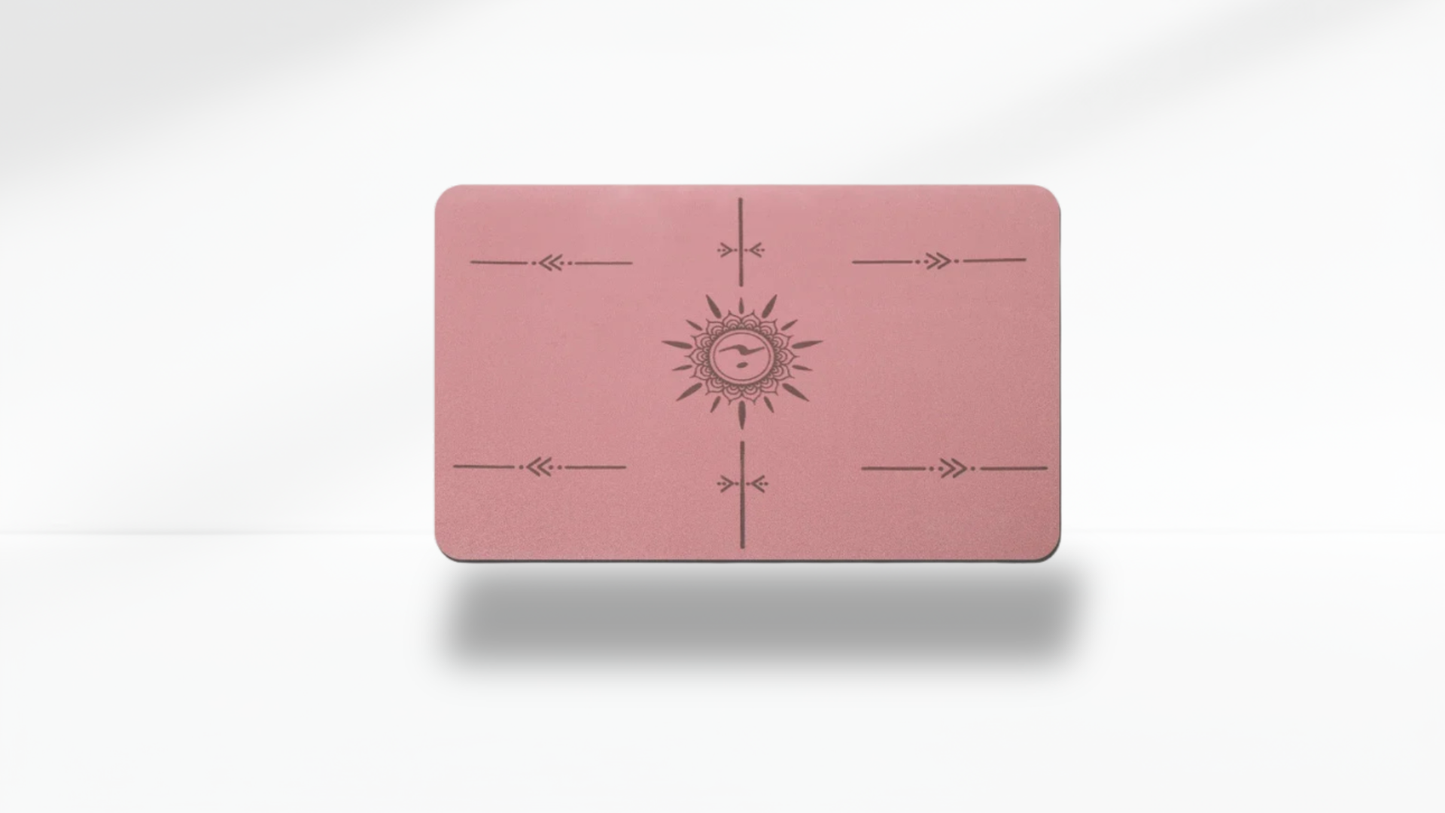 Front view of a pink mini flat support yoga mat with alignment markers on a clean white background.