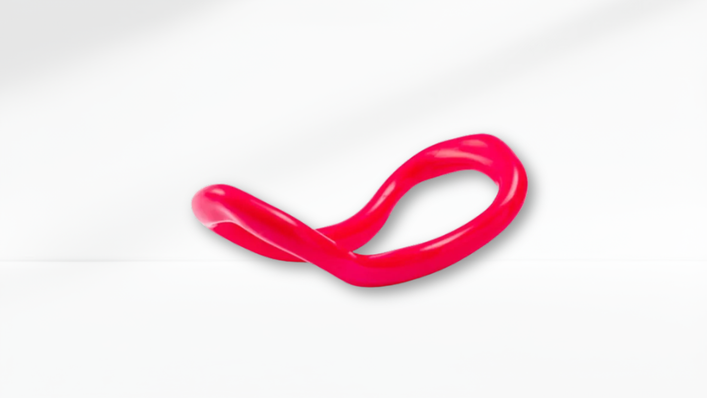 red pilates ring on a white background